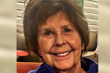 Close-up of Nancy Guthrie, an older woman with short brown hair, smiling indoors.