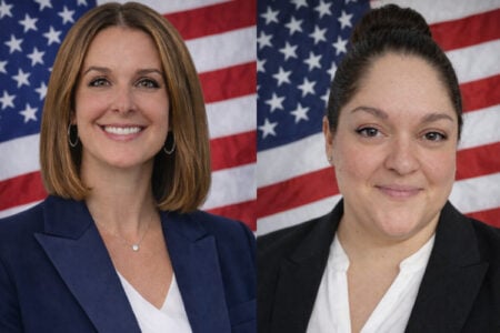 Two women in business attire are shown in a split portrait against an American flag background.