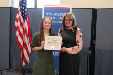 Jenna Lindstrom receives a New York State Senate Citation from Senator Pam Helming in a Finger Lakes ceremony.