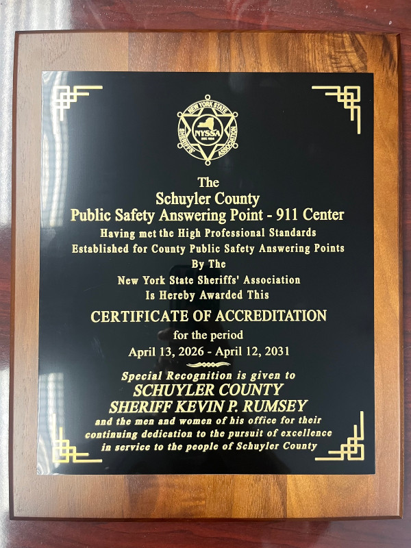 Plaque awarded to Schuyler County 911 Center/Sheriff Rumsey from NYSSA for accreditation, effective April 2026-2031.