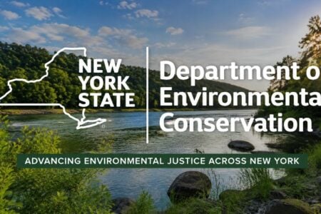 New York State Department of Environmental Conservation text and map over a river valley with lush hills and sun rays, promoting environmental justice.