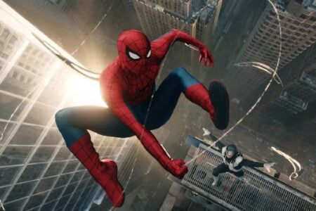 Spider-Man swings down through a city canyon, with a black and white suited figure visible on a building.