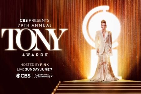 Singer Pink, in a cream outfit, stands on a stage with the Tony Awards logo, promoting the 79th Annual Tony Awards she will host.