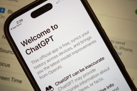 Close-up of a smartphone screen showing "Welcome to ChatGPT" and a warning that "ChatGPT can be inaccurate.