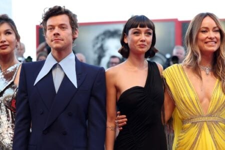 Don't Worry Darling stars Gemma Chan, Harry Styles, and Olivia Wilde pose on the red carpet at Venice Film Festival.