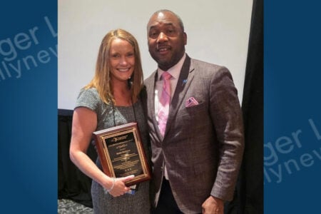 Kerry Brennan, NYS Civil Service Chief of Staff, accepts her Civil Service Ambassador Award at an event.