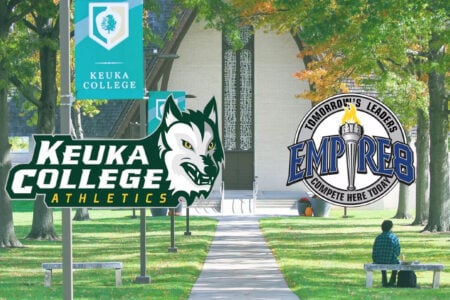 Keuka College Athletics wolf logo and Empire 8 torch logo on a fall campus backdrop with a student on a bench.
