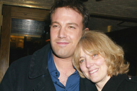 Actor Ben Affleck and his mother Christine Anne Boldt smiling together indoors.