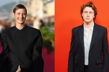Smiling woman in black top on a red carpet; man with curly hair in a dark suit against an orange background.