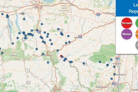 New York weather report map with wind (blue), flooding (orange), and a tornado (red) near Binghamton and Finger Lakes areas.
