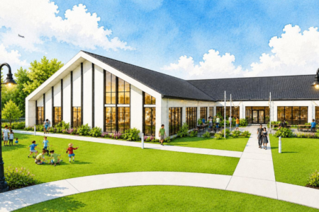 Architectural rendering of a modern white building with a black roof, outdoor seating, and a green lawn where children play.
