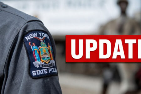 Grey New York State Police uniform shoulder patch with state seal, overlaid with a red 'UPDATE' banner.